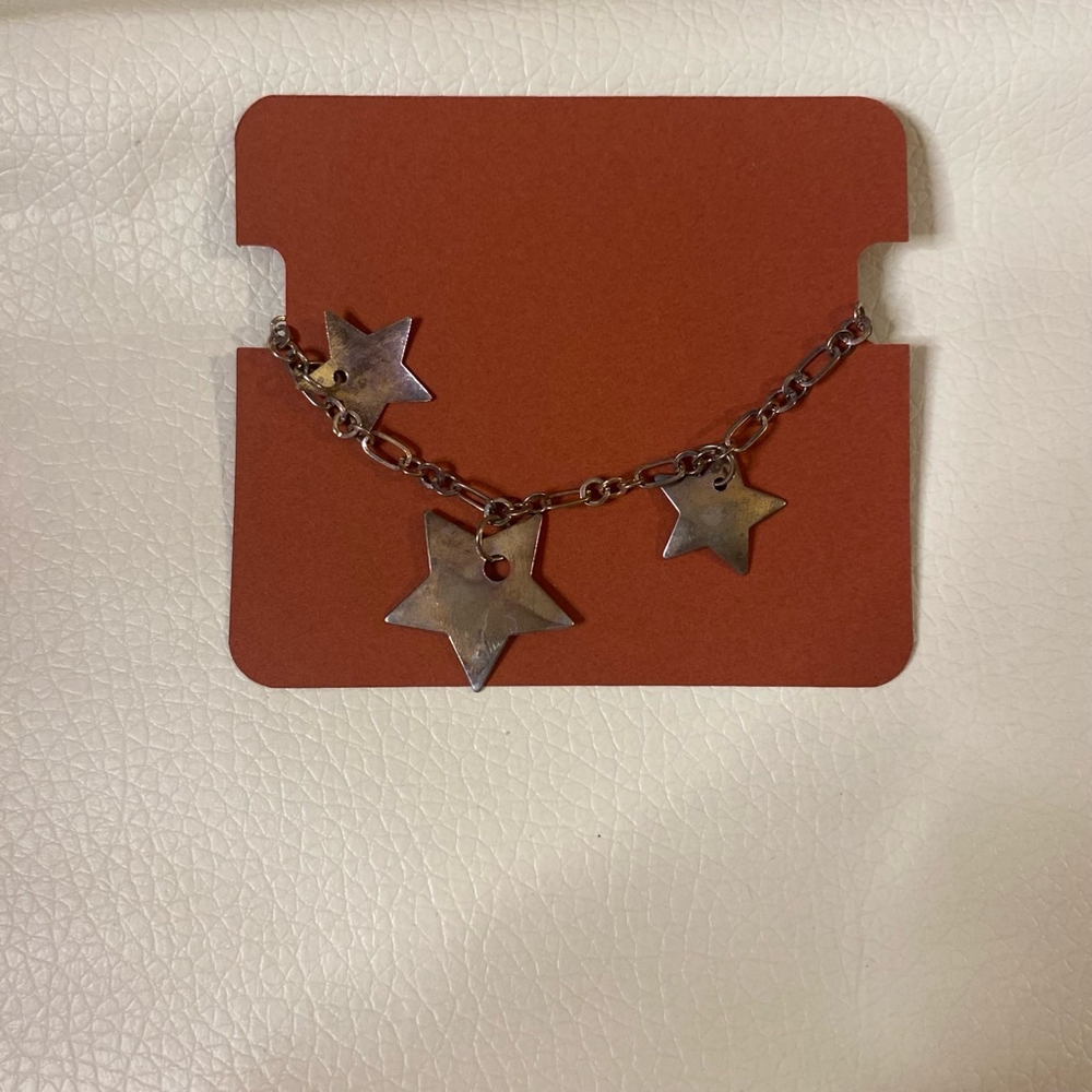 Silver Tone Star Chirm Bracelet
